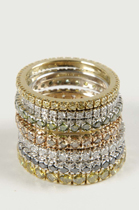Anelli realizzati in oro giallo, oro bianco, oro rosa e oro nero con diamanti incolore, fancy yellow, brown, black e green
